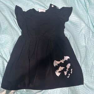 Black Dress with White Bat Design